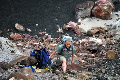 Karyn Rogers on volcanic surface